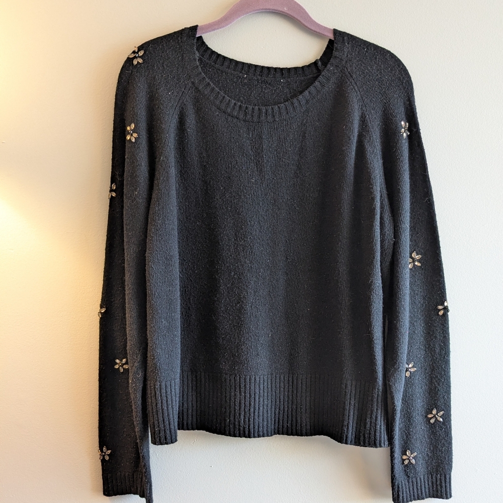 Chic Black Sweater with Floral Details